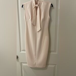 Light pink front bow Calvin Klein dress.
